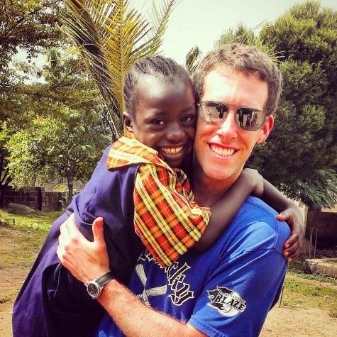 Jeff Iker with a child during his trip to Africa. Iker went to Nigeria and was concerned when her returned people would assume he got ebola. 