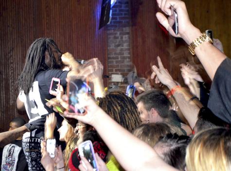 It wasn't long until Waka was off the stage and onto the floor with fans