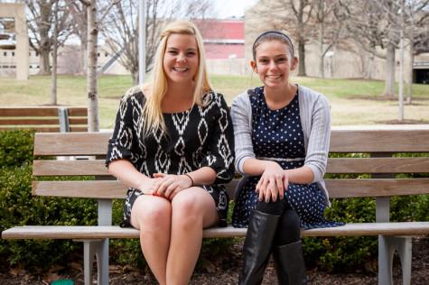Presidential Candidate Ellie Kremer (left) and Vice Presdiential Candidate Hannah French (right) sit on a bench in the plaza. Their platform is based on community and student involvement.