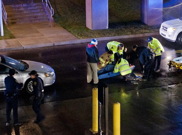 The male victim had raised his hand and was clearly coherent as police and paramedics prepared to move him to an ambulance. 