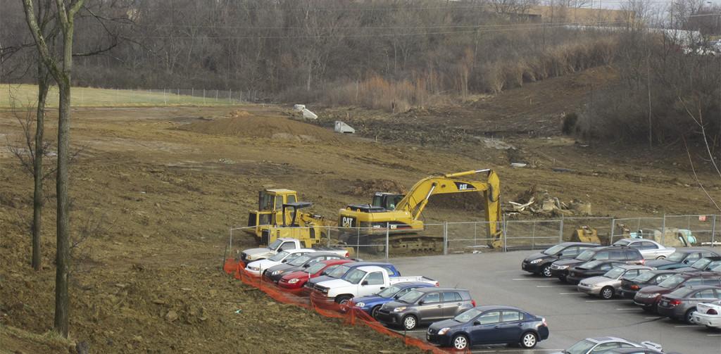 Weather, parking slowed field construction