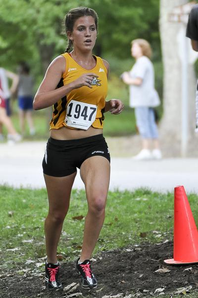 Senior runner takes school record, competitive edge before graduation