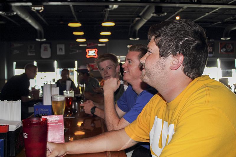 Three Northern Kentucky University Senior Marketing Majors, Matt Crum(left) Jordan Smith (middle) and Jacob Fox (right) enjoying their time at Dunkers Sports Bar & Grill on Tuesday, August 20 of 2013.