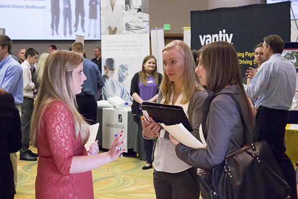 Students talk to business people from around the area about jobs at the NKU Career Fair in the Student Union on Tuesday, Sep. 24, 2013.