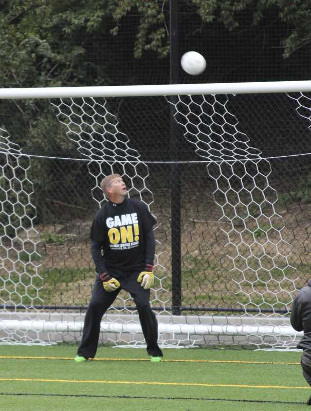 Dean of students Jeffrey Waple played goalie while students took shots. 