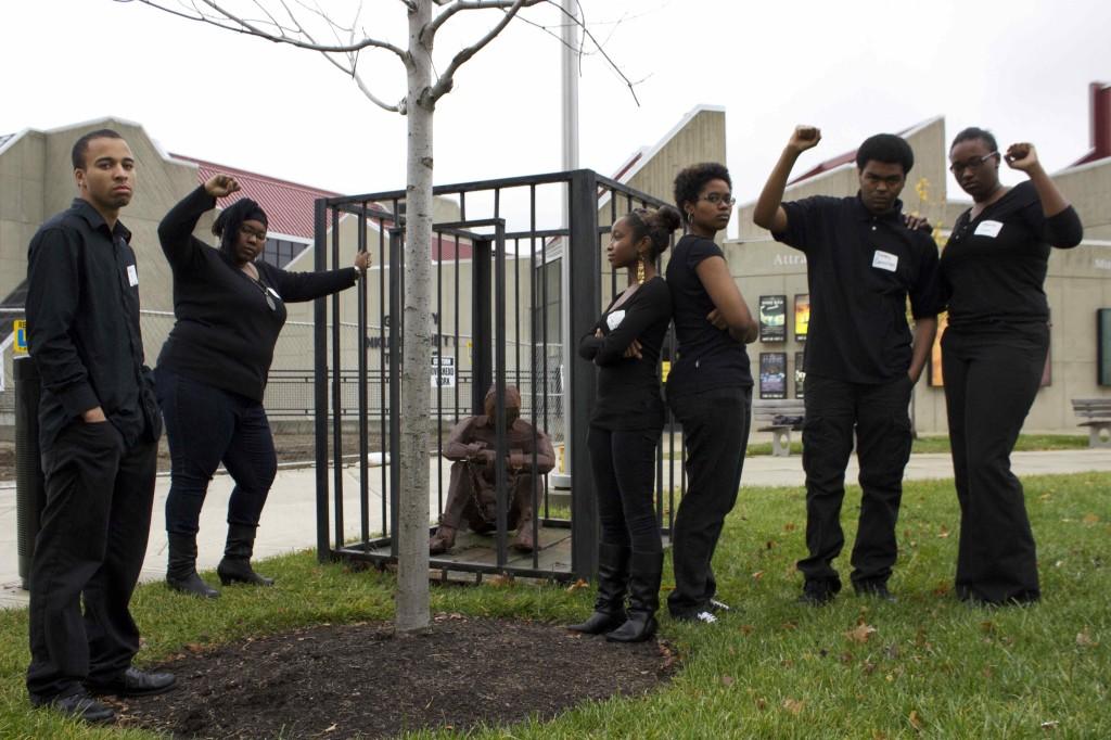 Members of the Black United Students organization at NKU pose on campus. Some members of this organization have recently voiced their concerns with the treatment of African-Americans within the university.