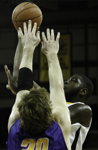 Jalen Billups (#21) shoots the ball in the first half, finishing with 11 points and 5 rebounds.  The Norse lost 74-61 to Morehead State on Tuesday, November 19, 2013 at the Bank of Kentucky Center in Highland Heights, KY.