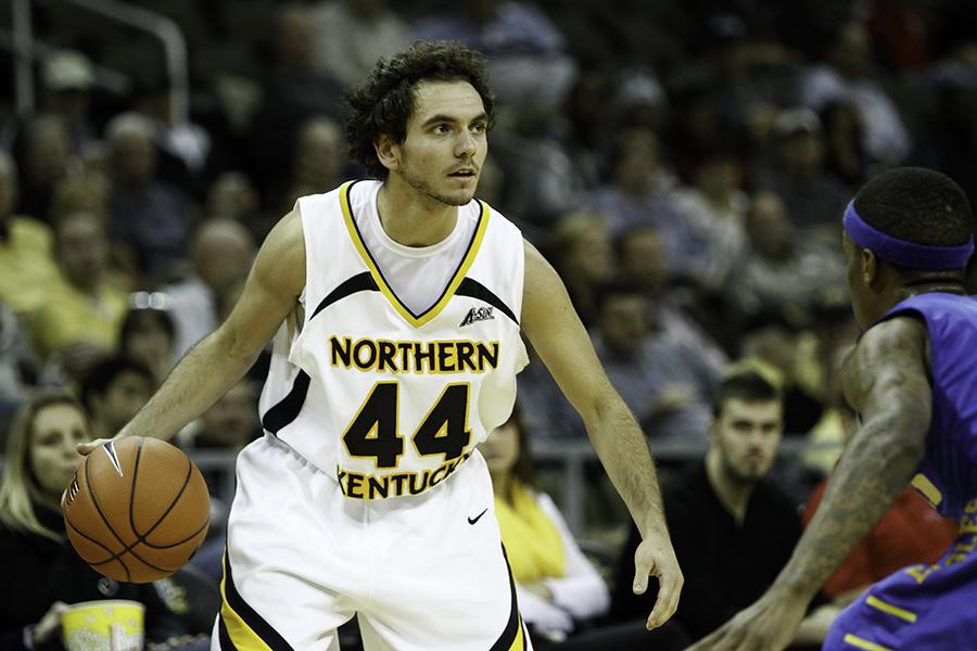 Dean Danos (#44) dribbles the ball in the second half waiting for a teammate to get open. The Norse lost 74-61 to Morehead State on Tuesday, November 19, 2013 at the Bank of Kentucky Center in Highland Heights, KY.