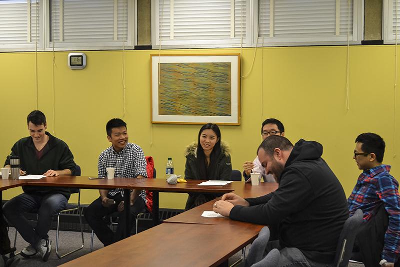 Students gather for the Chinese Chat. Together, they practice reading and speaking Chinese. 