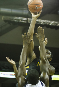 NKU's Jalen Billups shoots the ball, finishing with a double double with 12 points and 12 rebounds in NKU's loss to FGCU Thursday night. NKU lost to Florida Gulf Coast 64-50 Thursday, February 6, 2014 at The Bank of Kentucky Center.