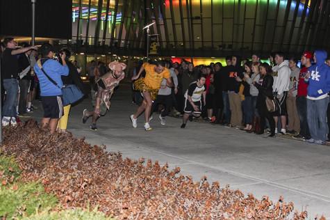 The first set of runners hit the track at The Nearly Naked Mile, which kicked off the week of Homecoming events. 