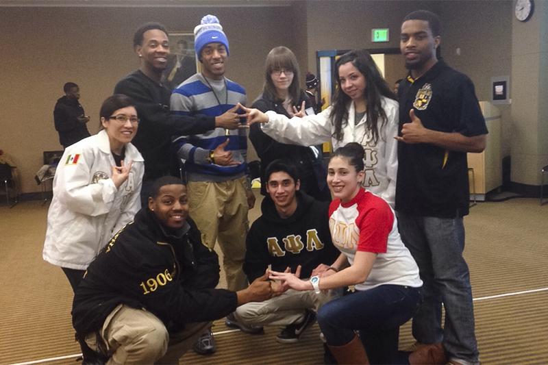Members of Alpha Psi Lambda National, Inc. and Alpha Phi Alpha Fraternity Inc. together at the Colors of Love event.