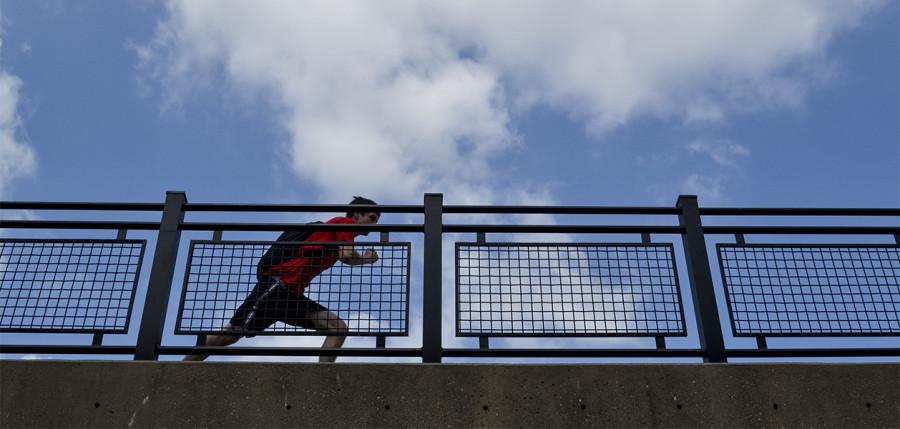 A student runs across campus. In the upcoming 30 for 30 challenge, participants will receive weekly emails on the benefits of physical activity. 