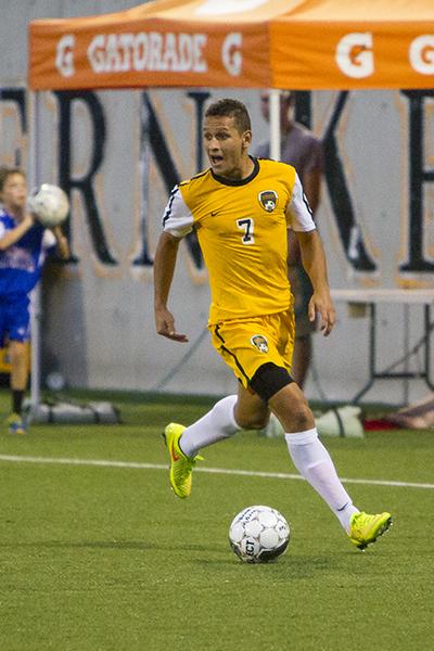 NKU mens soccer player, Alwin Komolong (7),