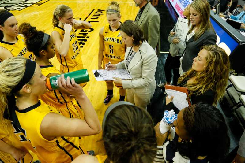 NKU Womens Basketball huddling up during NKUs tournament win against McNeese State on March 20, 2014. The A-SUN has changed their rules allowing all schools championship eligible in 2014.