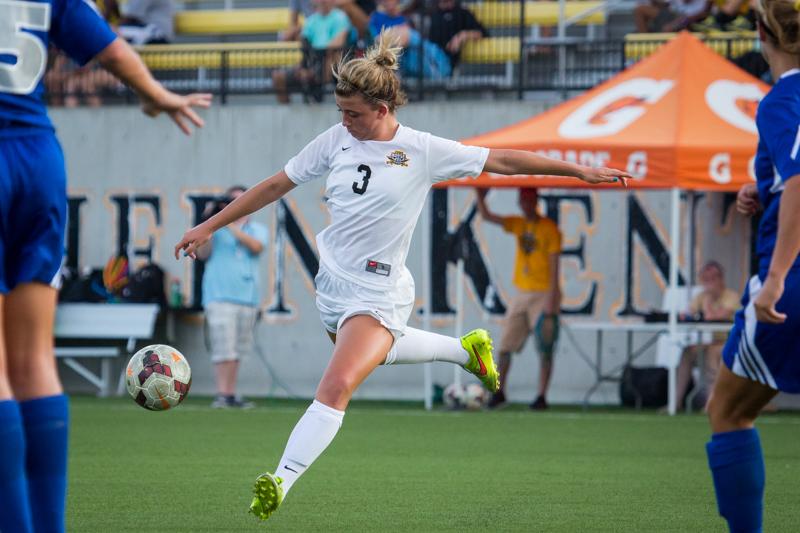 NKU women's soccer player, Macy Hamblin shoots the ball during NKU's 4-0 win against Eastern Illinois University. NKU defeated Eastern Illinois University 4-0 after the game was called due to lightning in the area.