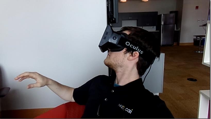 Branden Middendorf tests out the Oculus Rift.