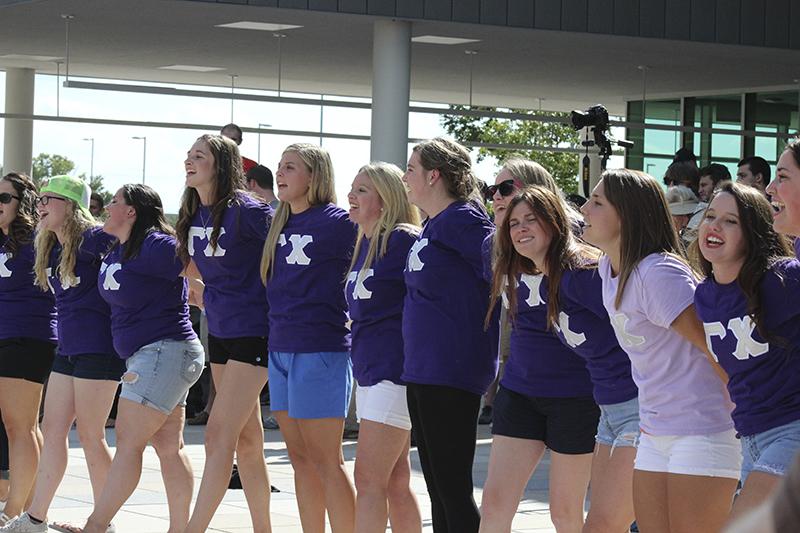 Gamma Chis stand in line waiting for their new sisters.