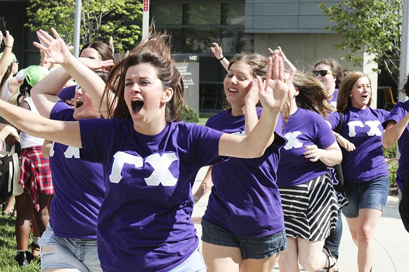 Gamma Chi's Arnela Zekic and Elizabeth Ruwe take part in the bid day festivities. The event lets students meet their new 'families' as well as promote sisterhood.