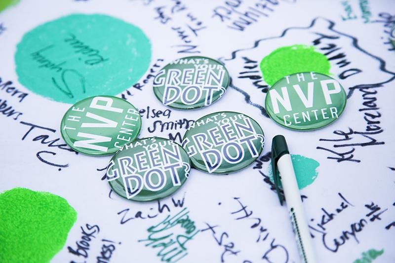 Nose Violence Prevention handed out buttons on its campus-wide launch day. It has a Green Dot training session on Thursday, Sept. 18 to promote bystander intervention. 