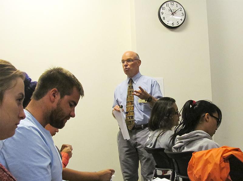 Paul Ellis, director of the Learning Assistance Program, gives freshmen tips for collaborative studying.