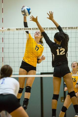 NKU's Jenna Ruble spikes the ball over the net in NKU's 3-2 win over Evansville. The Norse beat Evansville 3-2 in Regents Hall on Sept. 16, 2014.