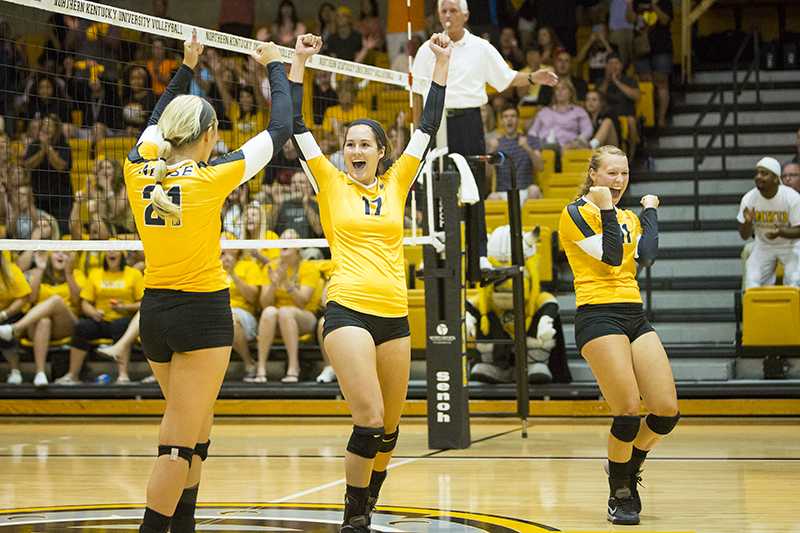 NKUs Jenna Ruble (17), Jayden Julian  (21) and Taylor Snyder  (11) celebrate a point during the Norses 3-0 win over Samford University. Northern Kentucky University won 3-0 against Samford University in the inaugural Northern Kentucky Volleyball Invitational on Friday, Sept. 5, 2014 in Regents Hall in Highland Heights, Kentucky.