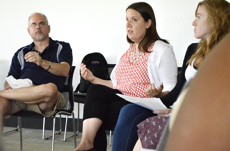 Ann James (center) discusses with students and staff the process the university takes when a student files a sexual assault claim.  