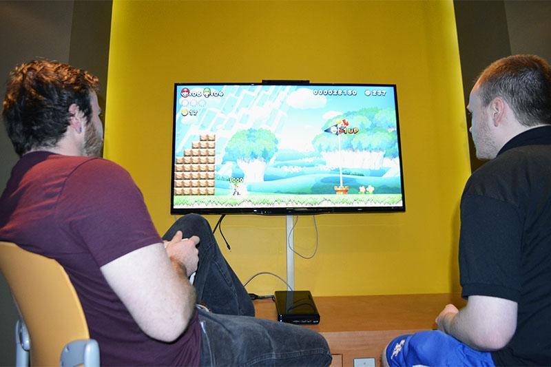 Two+students+play+Super+Smash+Bros.+U+in+the+game+room+at+NKU.+