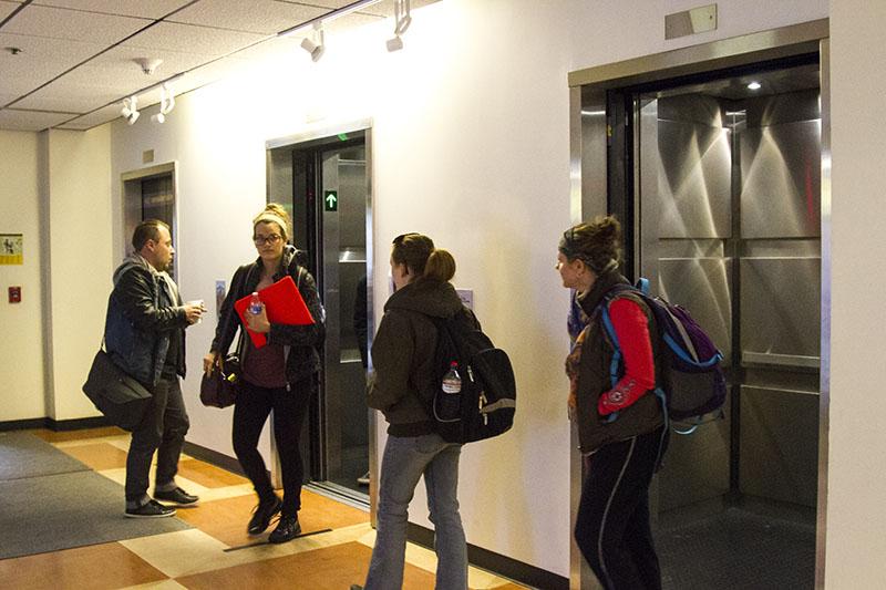 Students+enter+and+exit+the+renovated+Landrum+elevators.+The+elevators+were+originally+considered+unsafe.+