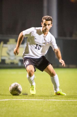 NKU midfielder Diego Martinez dribbles the ball towards the goal in NKU's 1-0 victory over Eastern Illinois. NKU defeated Eastern Illinois 1-0 at NKU Soccer Stadium on Wednesday, Oct. 29, 2014.