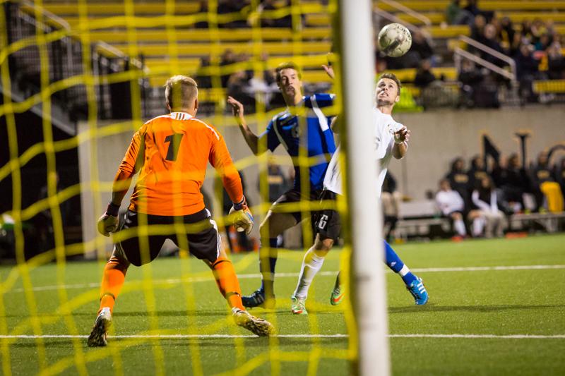 NKU midfielder Cian McDonald scores the lone goal in NKUs 1-0 victory over Eastern Illinois. NKU defeated Eastern Illinois 1-0 at NKU Soccer Stadium on Wednesday, Oct. 29, 2014.