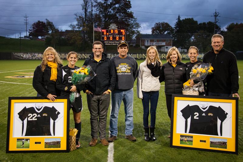 NKU celebrated senior day for its two seniors, CG Bryant (left) and Abbey Scherer (right) before their 1-0 win against Kennesaw State. NKU defeated Kennesaw State 1-0 off a header by Jessica Frey in the second half at NKU Soccer Stadium on Oct. 18, 2014.