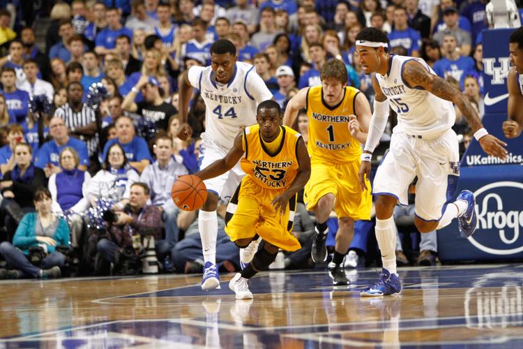 Todd Johnson (23) dribbles the ball up the court at University of Kentucky during the 2013-14 season.