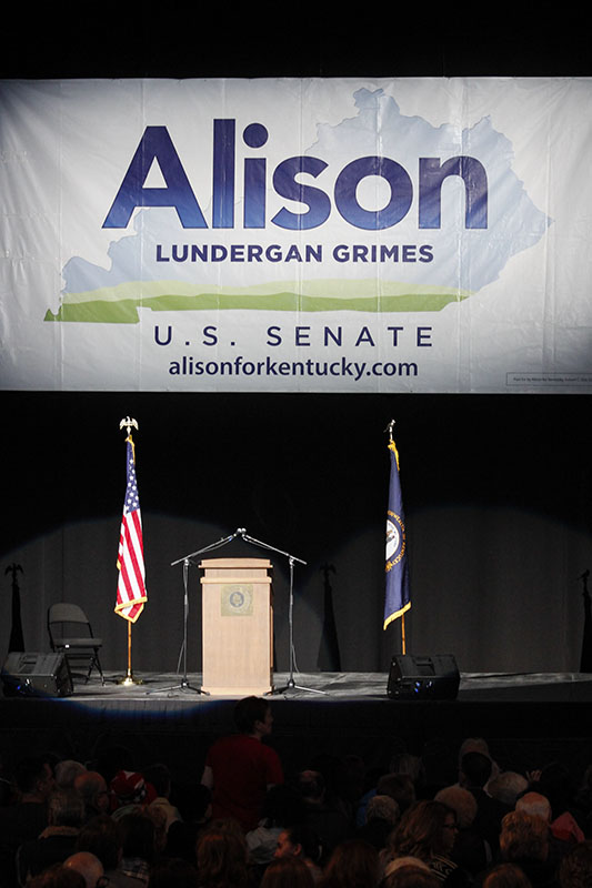 The stage is set at The Bank of Kentucky Center. An audience waited for Alison Lundergan Grimes and other speakers.