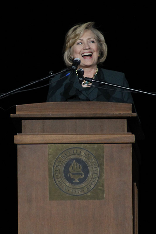Hillary Clinton speaks to a crowd in NKUs Bank of Kentucky Center. Clinton smiled as she mentioned her new grandchild.