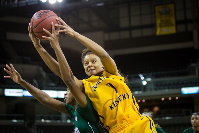NKU freshman Faith Sanders rebounds the ball against an Ohio University player during NKU's 38-77 loss. NKU lost to Ohio University 38-77 on Tuesday, Nov. 25, 2014 at The Bank of Kentucky Center.