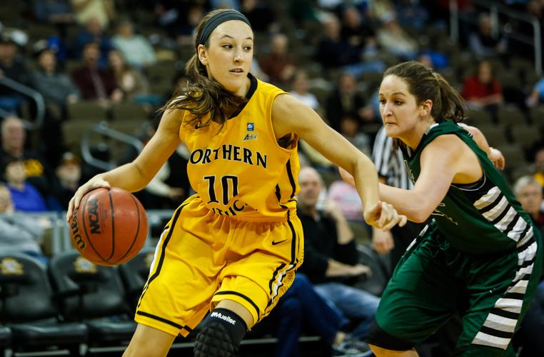 Christine Roush dribbles the ball up the court against USC during the 2013-14 season. 
