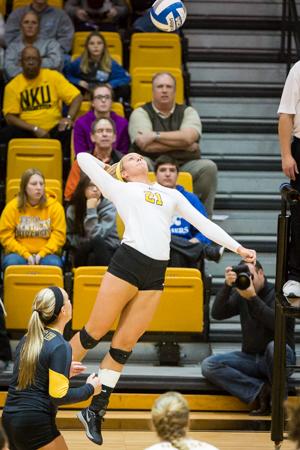 NKU's Jayden Julian jumps up to hit the ball across the net during NKU's 3-0 victory over Kennesaw St. NKU defeated Kennesaw State 3-0 at Regents Hall on NKU Campus on Nov. 14, 2014.