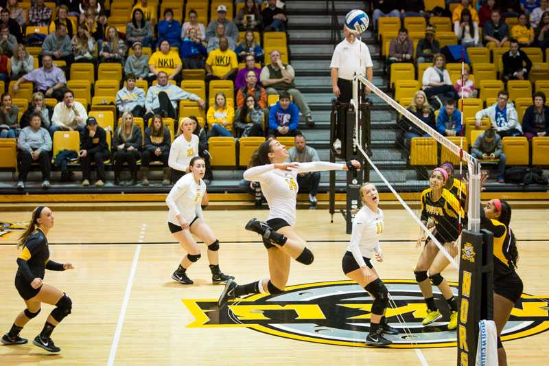 NKUs+Keely+Creamer+jumps+up+to+kill+the+ball+across+the+net+during+NKUs+3-0+victory+over+Kennesaw+St.+NKU+defeated+Kennesaw+State+3-0+at+Regents+Hall+on+NKU+Campus+on+Nov.+14%2C+2014.