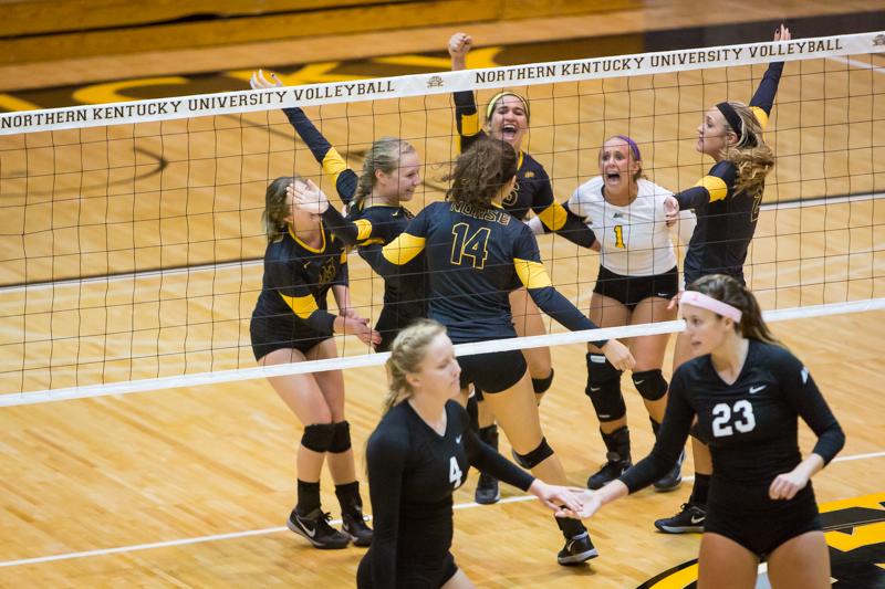 NKUs volleyball team celebrates after a NKU point against Stetson in the third set of NKUs 3-0 win against the Hatters. NKU defeated Stetson 3-0 at Regents Hall on NKU Campus on Saturday, Nov. 1, 2014.