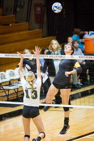 NKU senior, Jenna Ruble spikes the ball against USC Upstate during NKU's victory over Spartans. NKU defeated USC Upstate 3-1 on Saturday, Nov. 15, 2014 in Regents Hall on NKU campus.