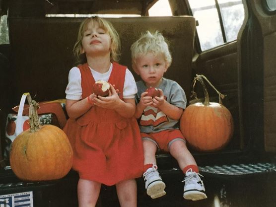 Brook and Ben at a young age after picking pumpkins, a family tradition they continued to do as they grew older.