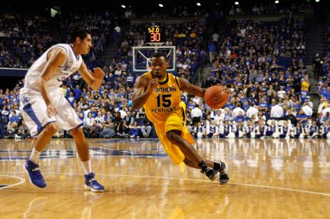 Daniel Camps dribbles the ball up the court during the 2013-14 season.