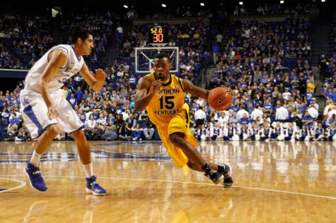 Daniel Camps dribbles the ball up the court during the 2013-14 season. 