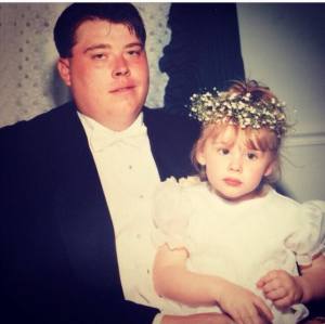 Brook and her father, Jimmy, pose together at her parents wedding.