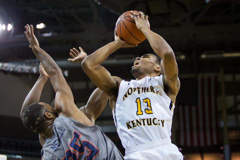 NKU player Daniel Camps goes up for the shot against UT Martin in the second half of NKU's 56-71 loss. NKU lost to UT Martin 56-71 at The Bank of Kentucky Center on December 3, 2014.