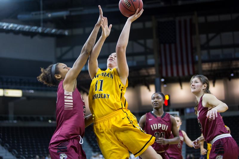 NKU's Melody Doss goes up for a shot during the second half of NKU's win over IUPUI. NKU defeated IUPUI 57-43 at the Bank of Kentucky Center on Tuesday, Dec. 30, 2014.