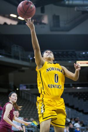 NKU's Shar'Rae Davis goes up for a layup during the second half of NKU's win over IUPUI. NKU defeated IUPUI 57-43 at the Bank of Kentucky Center on Tuesday, Dec. 30, 2014.