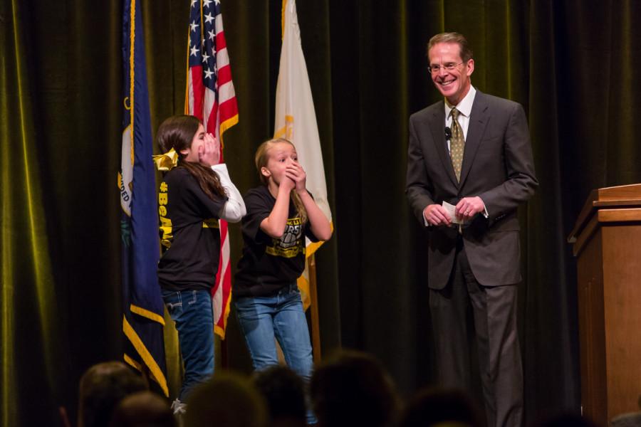 NKU President Mearns awarding two middle school girls a trip around campus and Cincinnati during during his 2015 Spring Convocation. President Mearns spoke about the past year and the upcoming year in the Student Union Ballroom on Friday, Jan. 9, 2015.